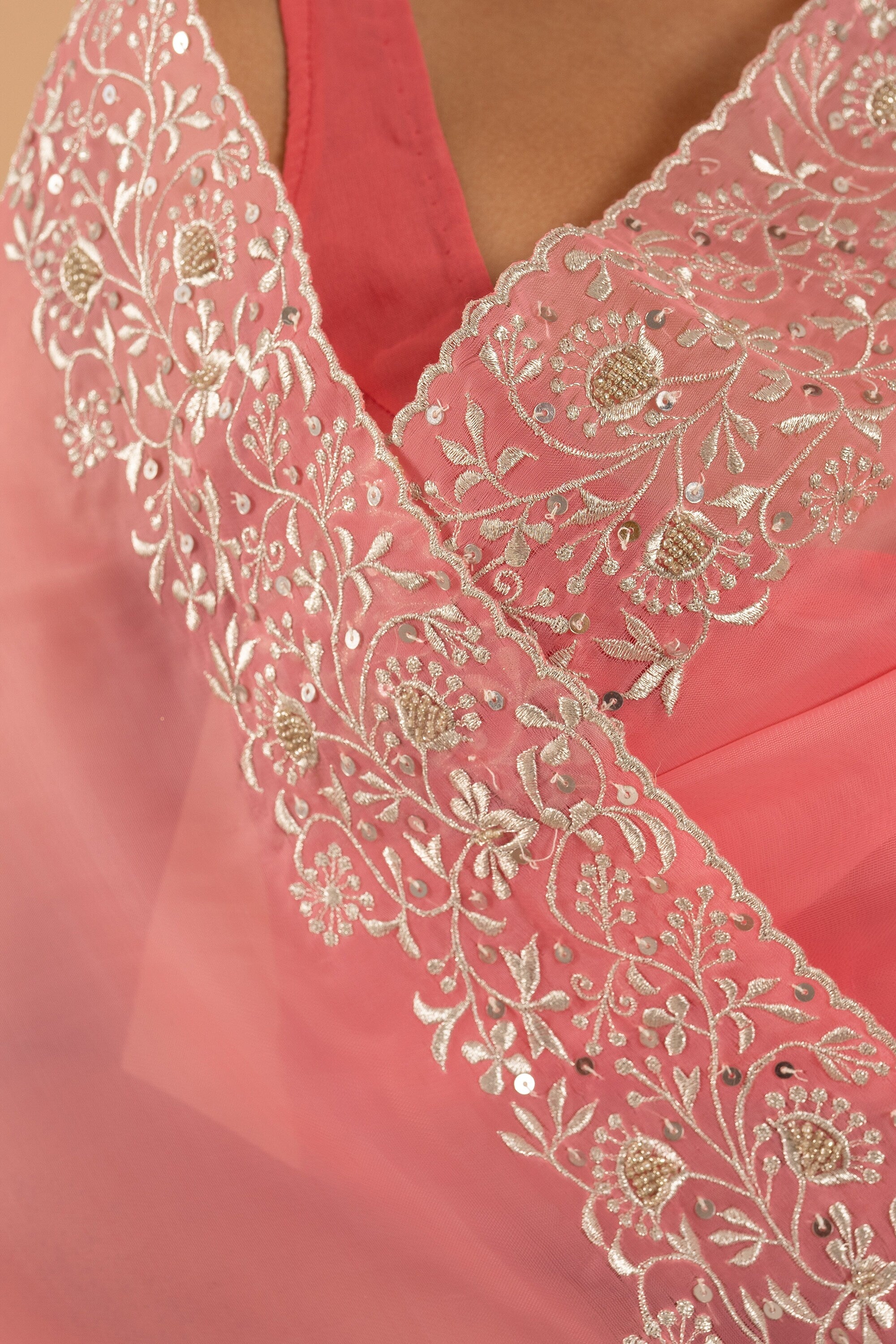 Pink and silver handwork embroidery organza saree with zari work border
